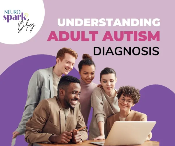 A group of autistic adults look at a computer together while discussing adult autism diagnoses.