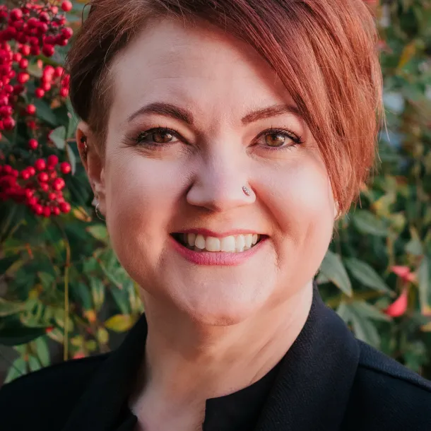 Headshot of Laurel Alexander, LCSW of NeuroSpark Health, specializing in neurodivergent coaching for autistic and ADHD adults.